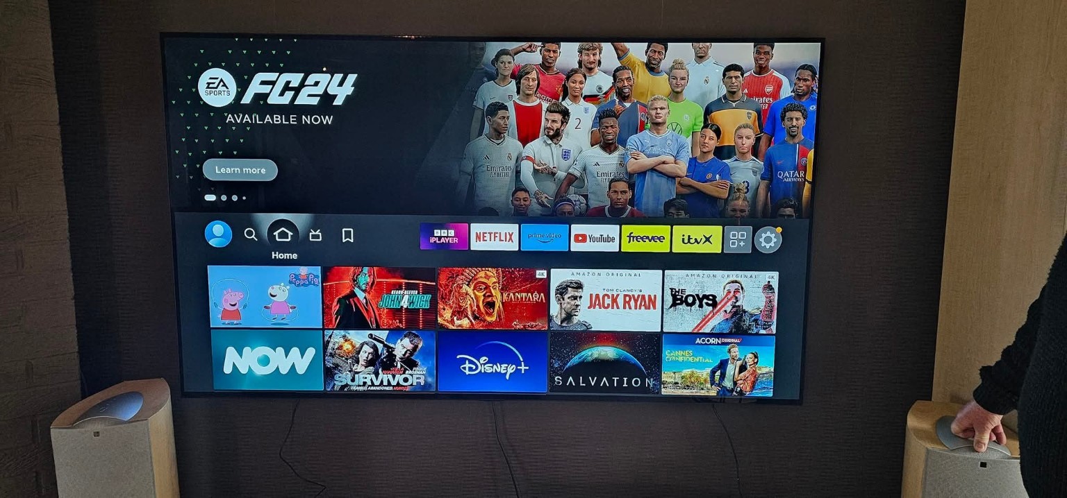 77-inch TV remounted on a swivel bracket