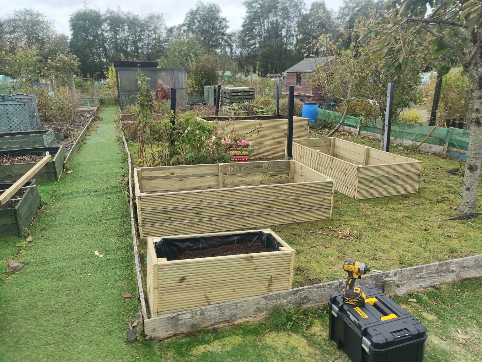 Four bottomless timber planters